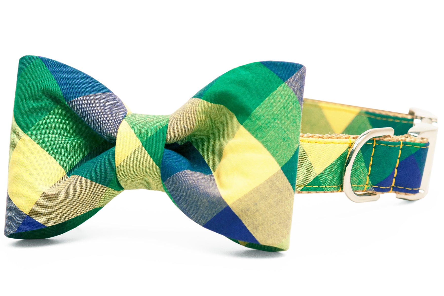 A dapper dog collar with an attached matching bowtie in classic Mardi Gras colors in a bold plaid print. Finished with sleek hardware and festive flair, this look is made for catching beads and compliments alike.