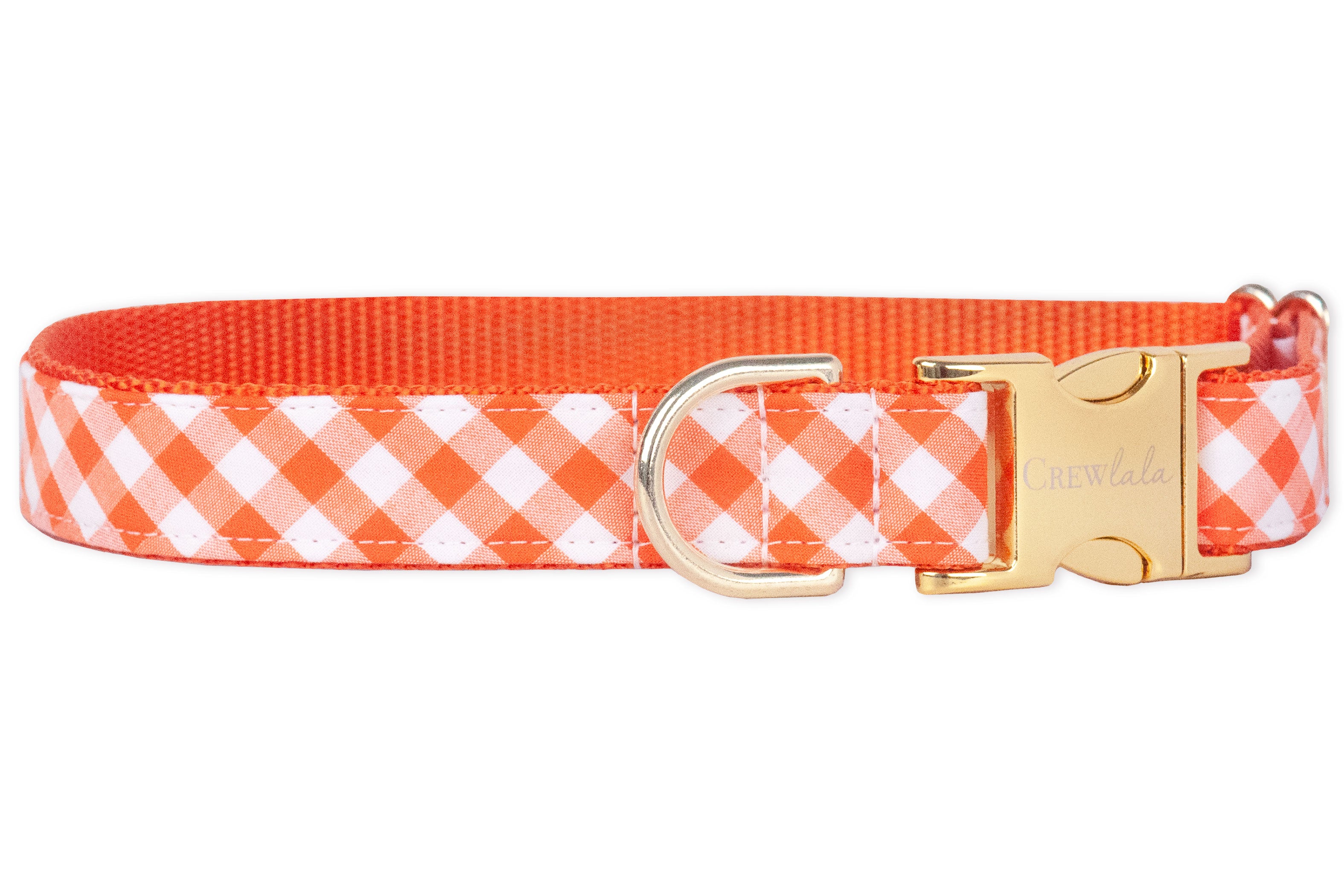 This cheerful dog collar features a bright orange plaid fabric with crisp white checks, lined with sturdy orange webbing. Finished with gold-tone hardware, it’s a picnic-ready accessory for plaid-loving pups.