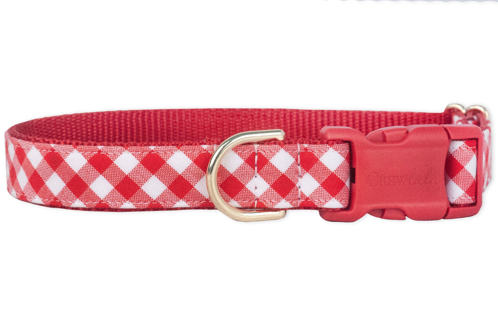 Classic red plaid dog collar featuring a checkered fabric overlay and reinforced red nylon backing. The collar has a red p[lastic buckle for secure closure and a D-ring for leash or accessory attachment.
